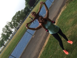 Extra Mile Walkers logo